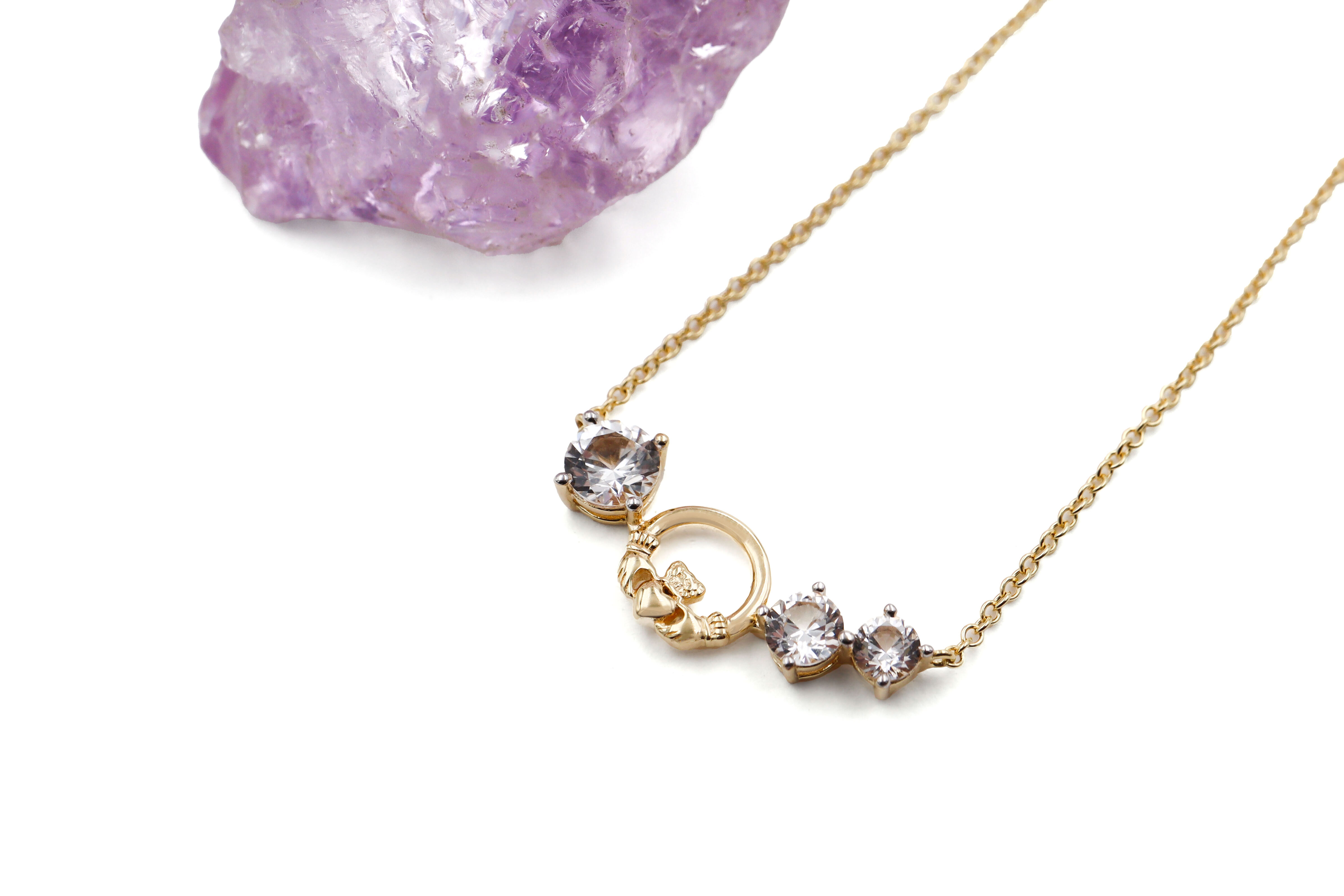 Irish Gold Vermeil Claddagh Necklace For Women With a Polished Finish. Pictured Flat.