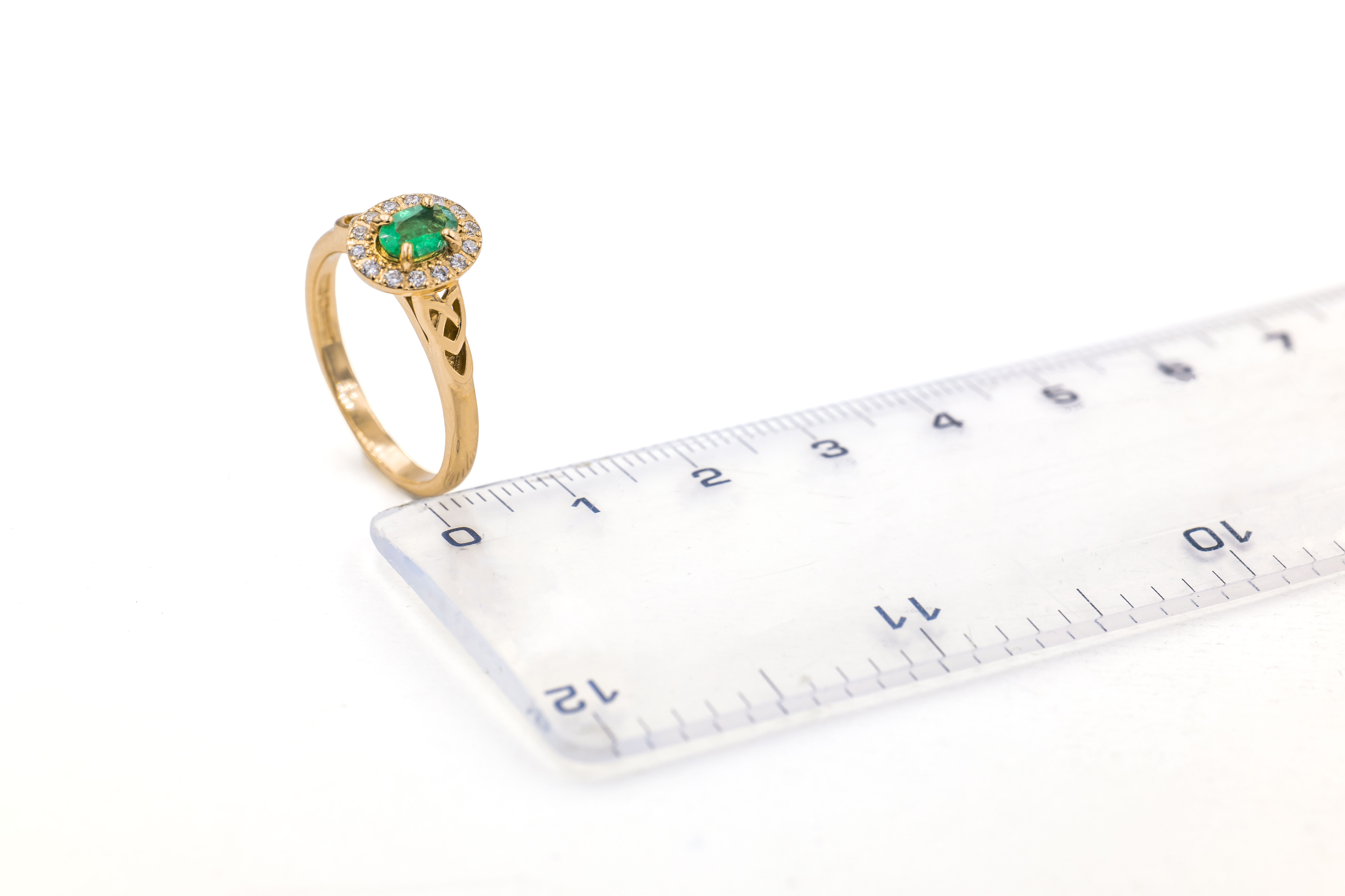 Striking 18K Yellow Gold Trinity Knot & Celtic Knot Ring For Women With a Polished Finish. Picture For Scale.