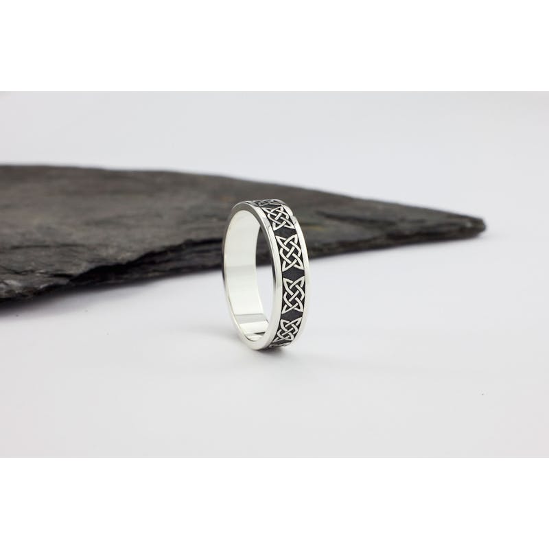Womens Celtic Knot Wedding Ring in Sterling Silver With a Oxidized Finish