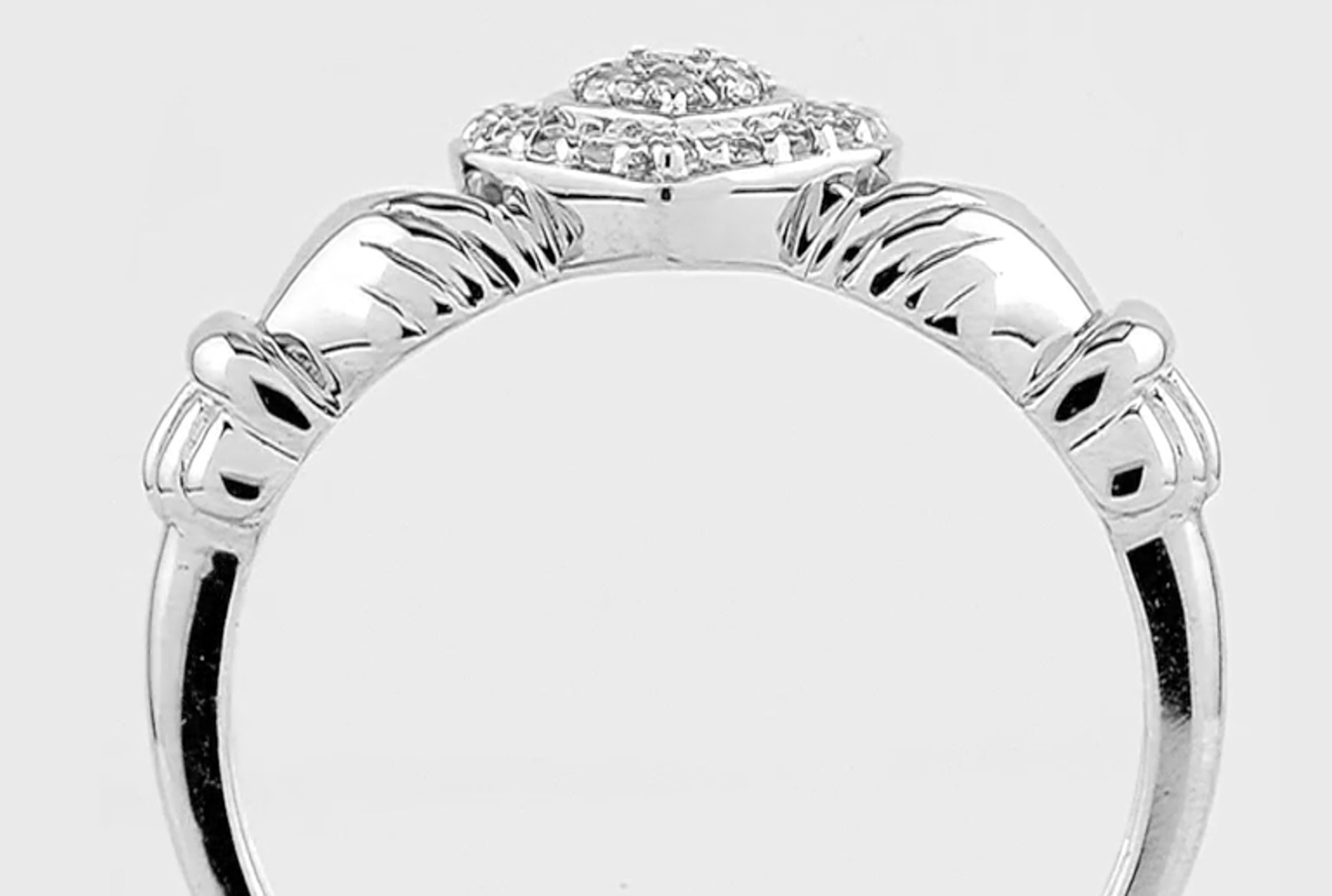 Womens Polished Claddagh Ring in Real 14K White Gold. Side View.