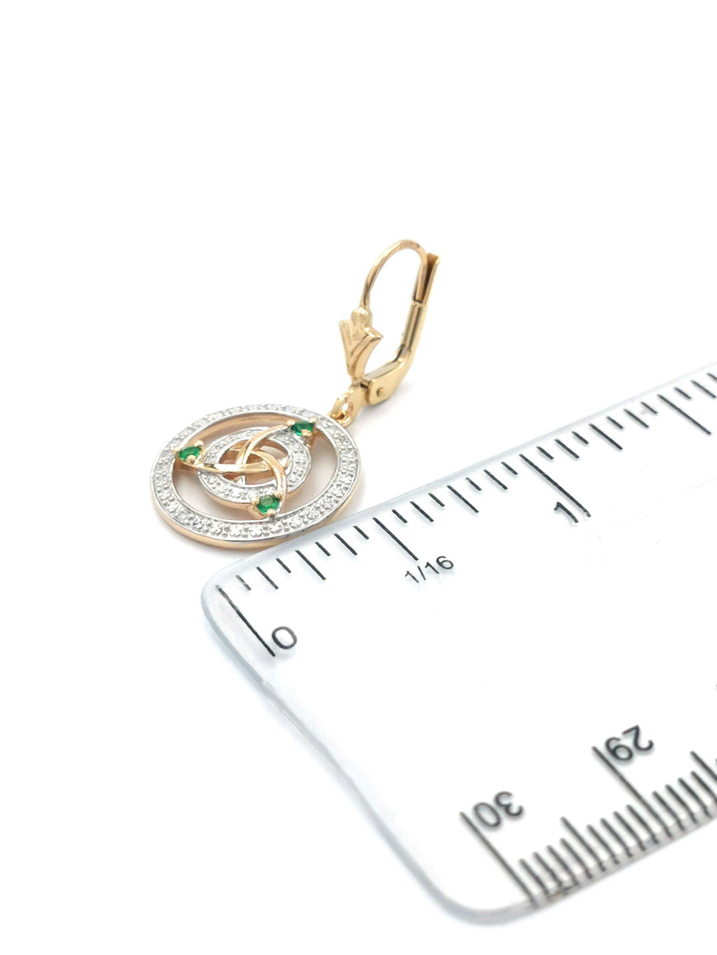 Womens Yellow Gold & White Gold Trinity Knot Earrings. Picture For Scale.