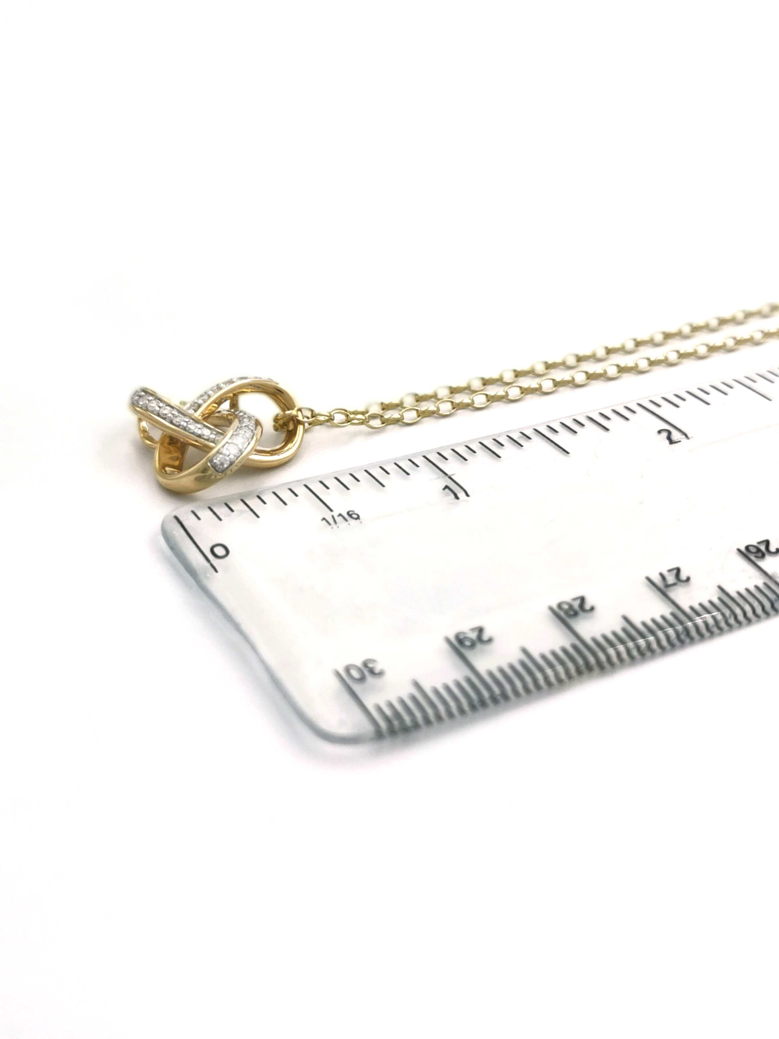 Irish 14K Yellow Gold Trinity Knot Necklace For Women. Picture For Scale.