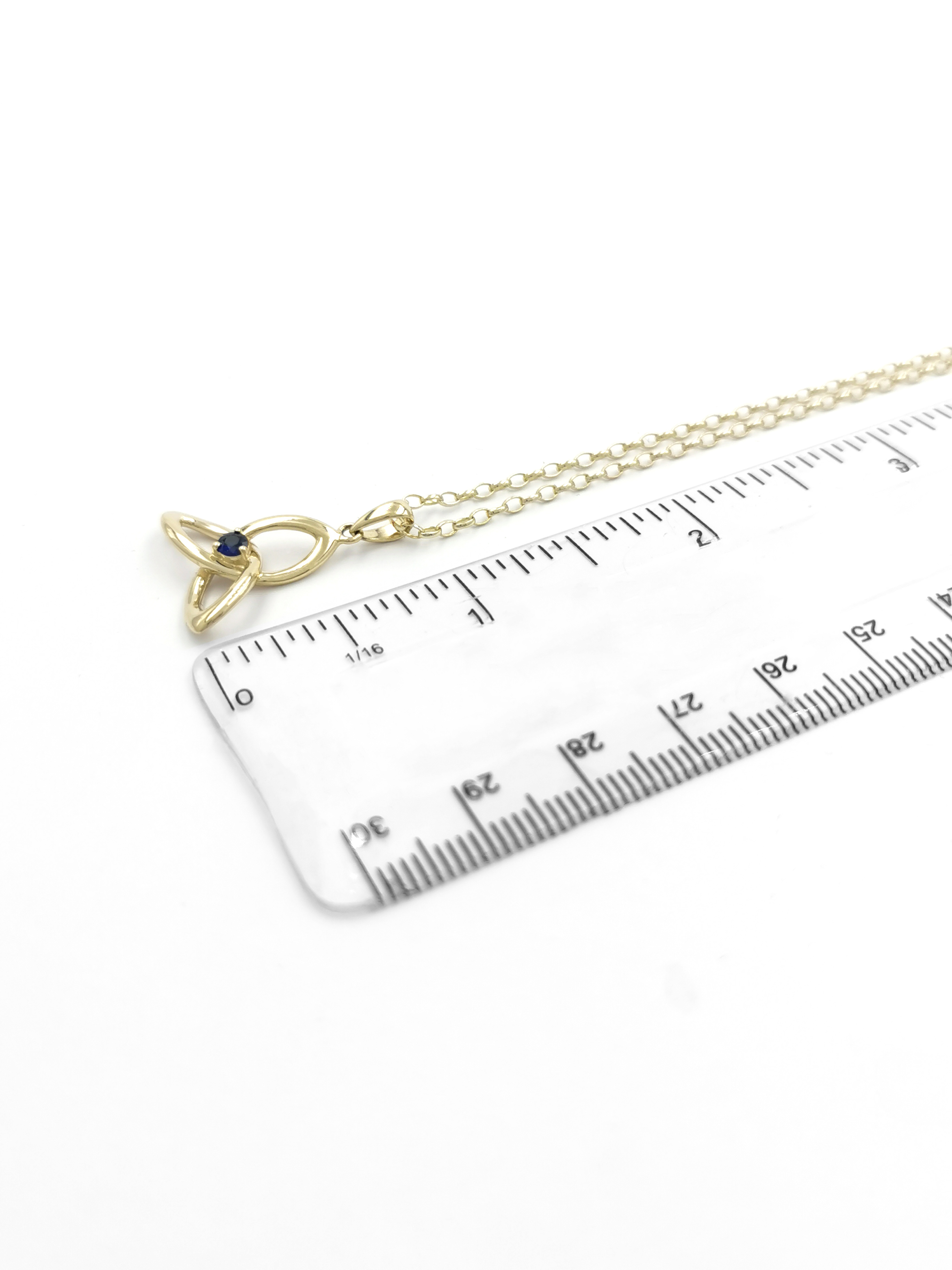 Luxurious Yellow Gold Trinity Knot & Celtic Knot Necklace For Women. Picture For Scale.