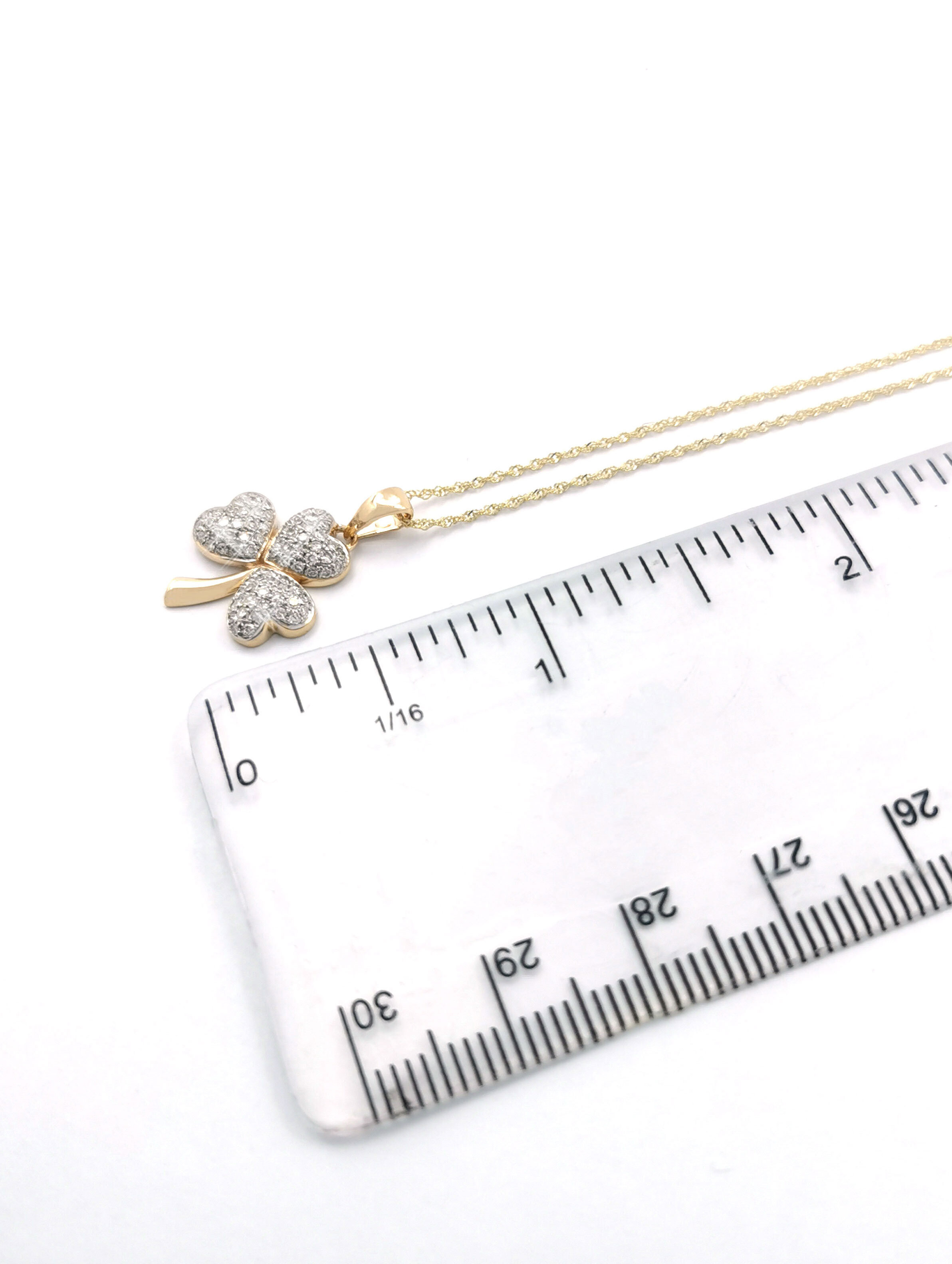 Striking Yellow Gold Shamrock Necklace For Women. Picture For Scale.