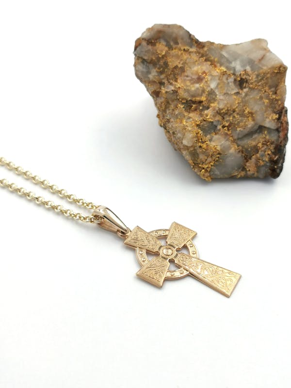 Attractive 10K Yellow Gold Celtic Warrior & Celtic Cross Necklace. Pictured Flat.