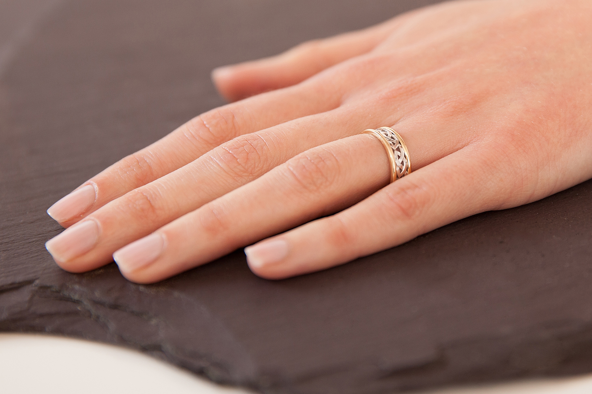 Striking White Gold & Yellow Gold Celtic Knot 6.9mm Ring For Women - Model Photo