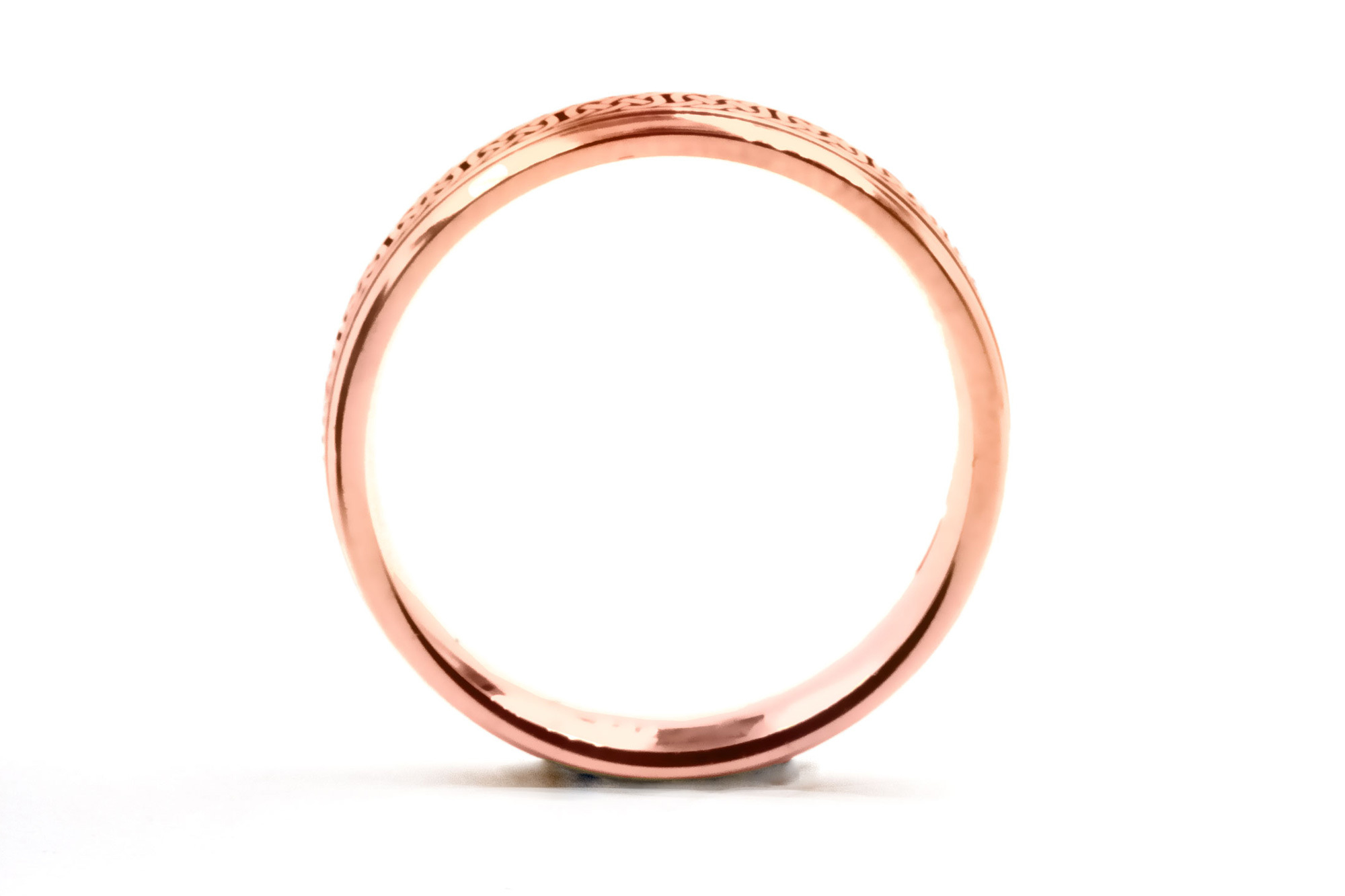 Gorgeous Rose Gold Celtic Knot 7.0mm Ring With a Cerin Finish. Side View.