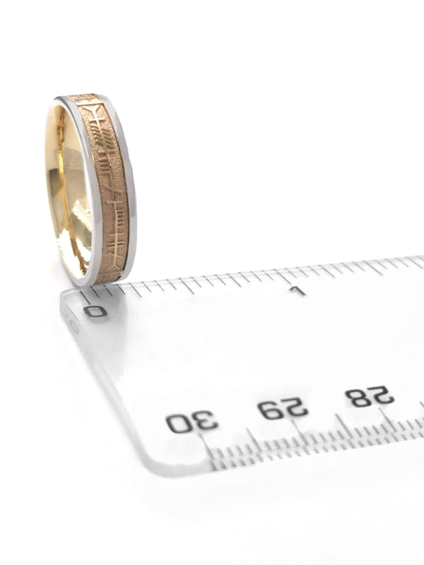 Gorgeous Yellow Gold & White Gold Mo Anam Cara & Ogham Wedding Ring For Men With a Florentine Finish. Picture For Scale.