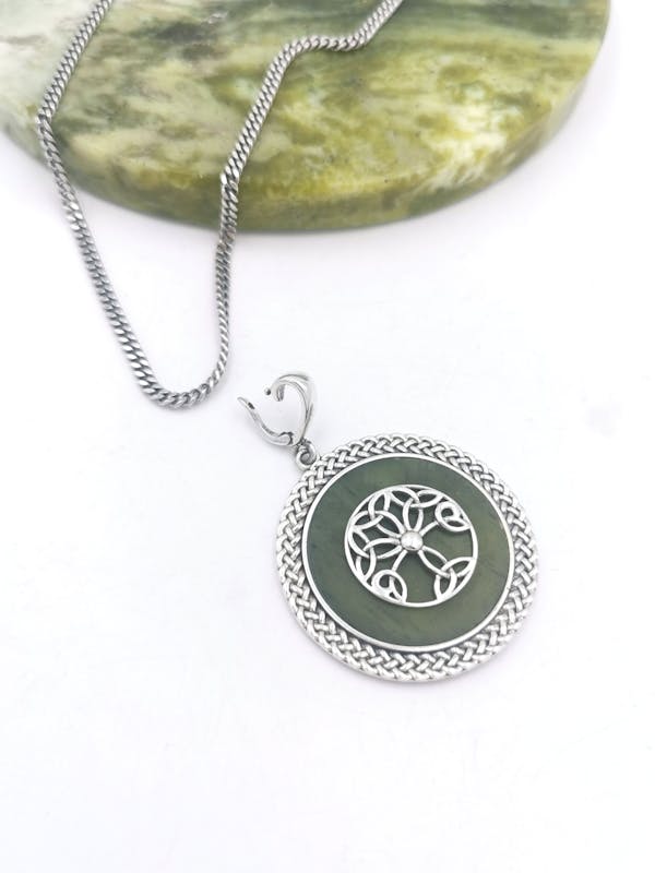 Womens Tree of Life Necklace in Sterling Silver. Pictured Flat.