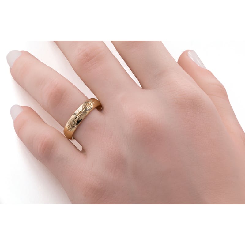 Ogham 5.0mm Ring in Yellow Gold With a Polished Finish - Model Photo