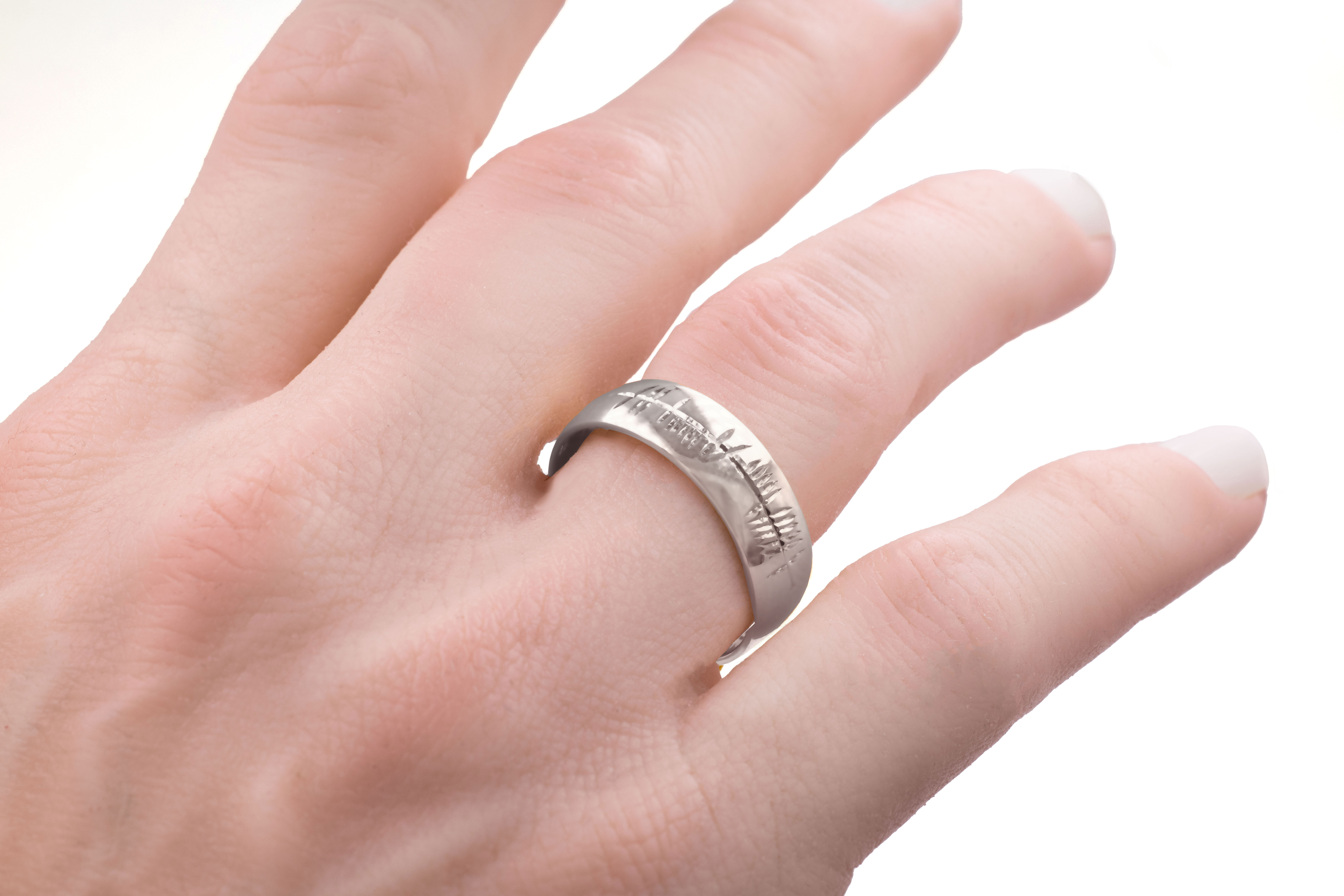 Authentic Platinum 950 Engravable Ogham 7.0mm Ring With a Polished Finish - Model Photo