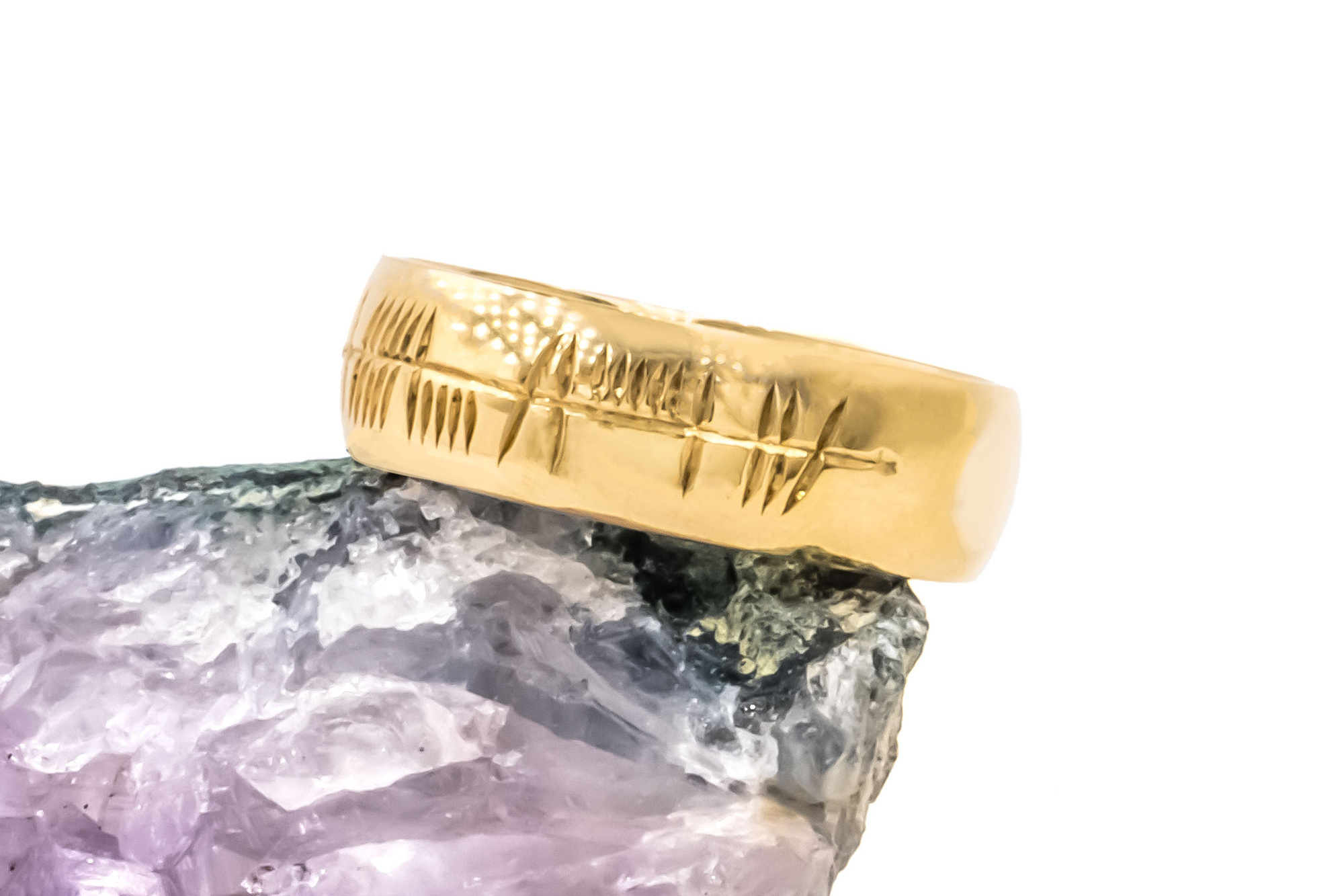 Striking Yellow Gold Ogham Ring With a Polished Finish