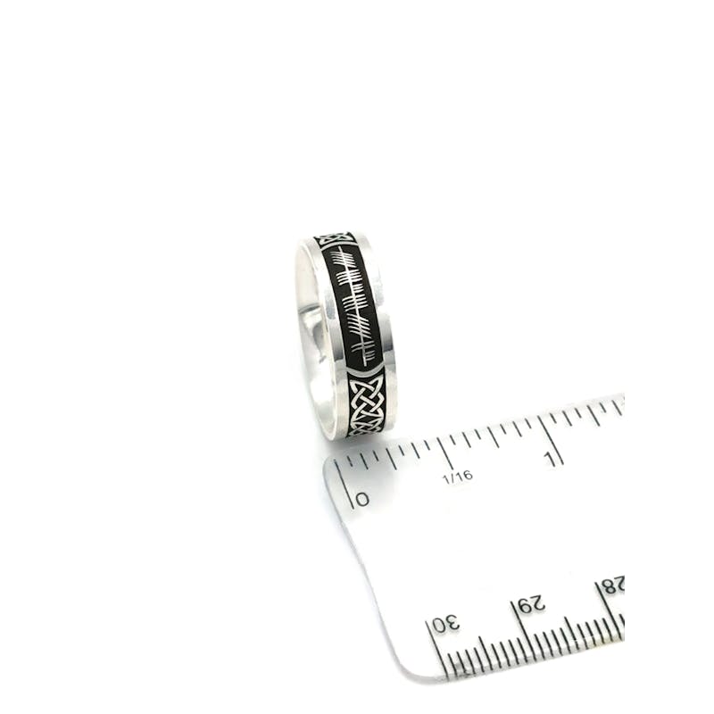 Oxidized Ogham Customizable Wedding Ring in Real Sterling Silver. Picture For Scale.