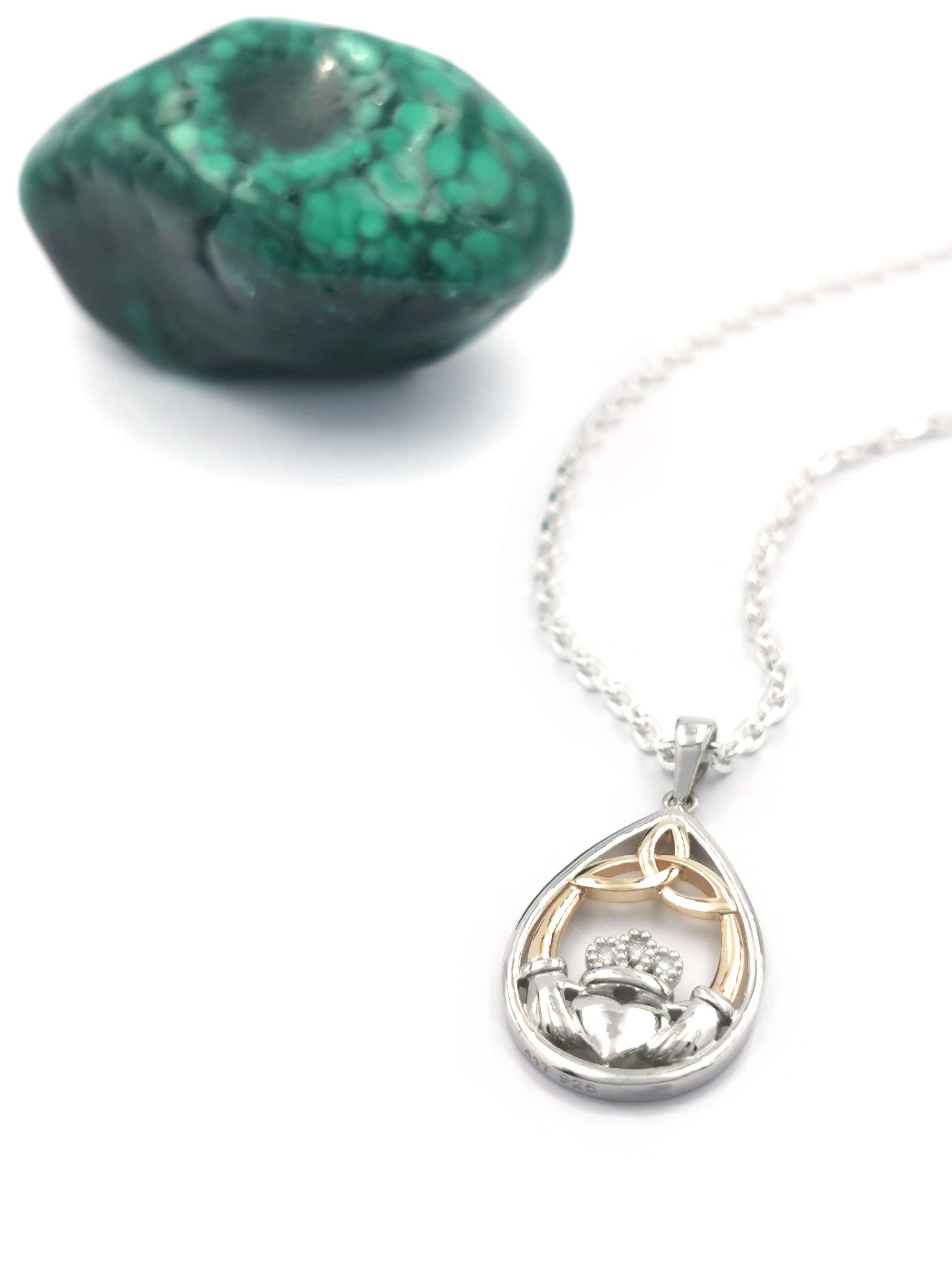 Womens Sterling Silver & 10K Yellow Gold Claddagh & Trinity Knot Necklace. Pictured Flat.