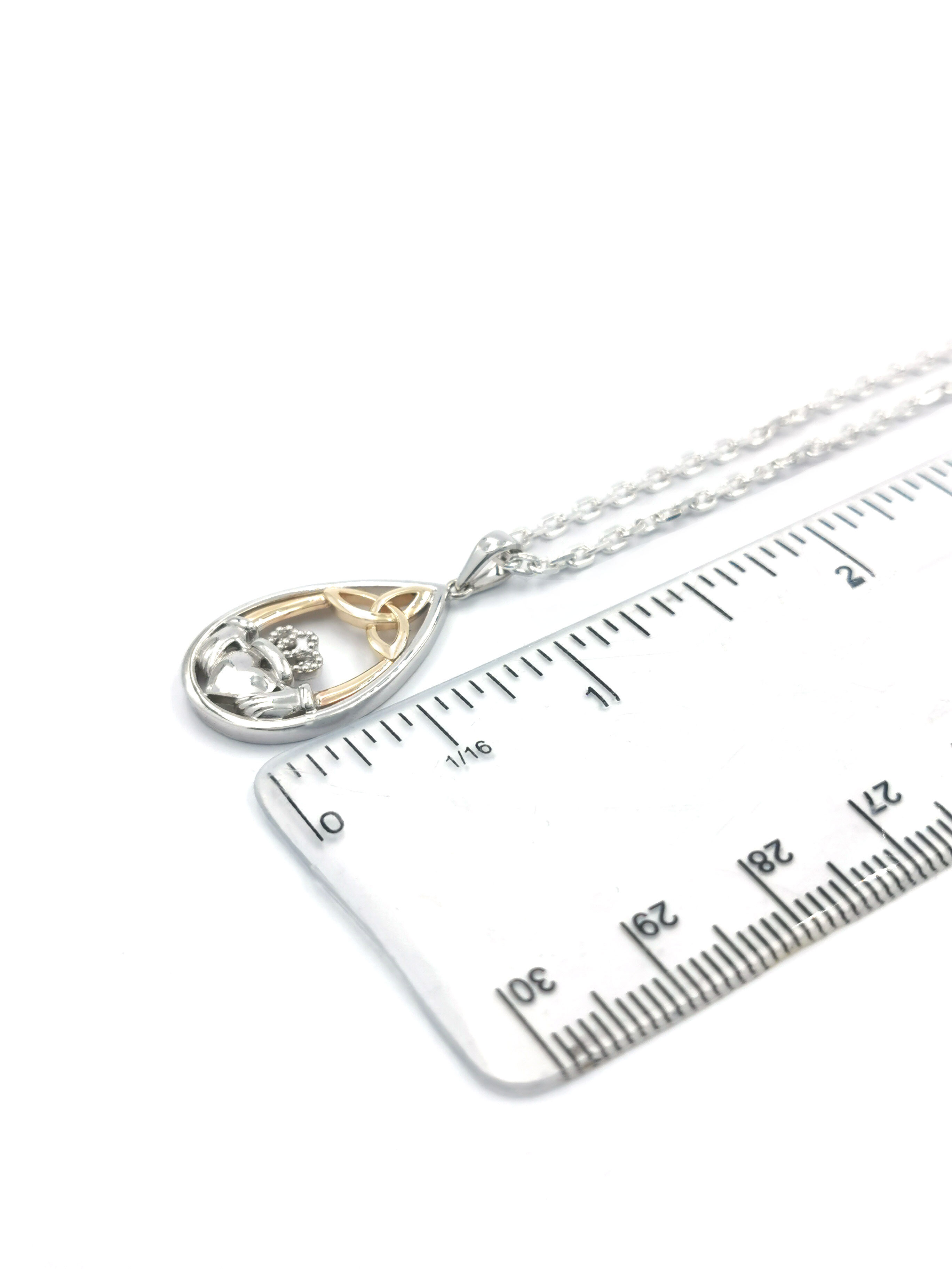 Genuine Sterling Silver & 10K Yellow Gold Claddagh Necklace For Women. Picture For Scale.