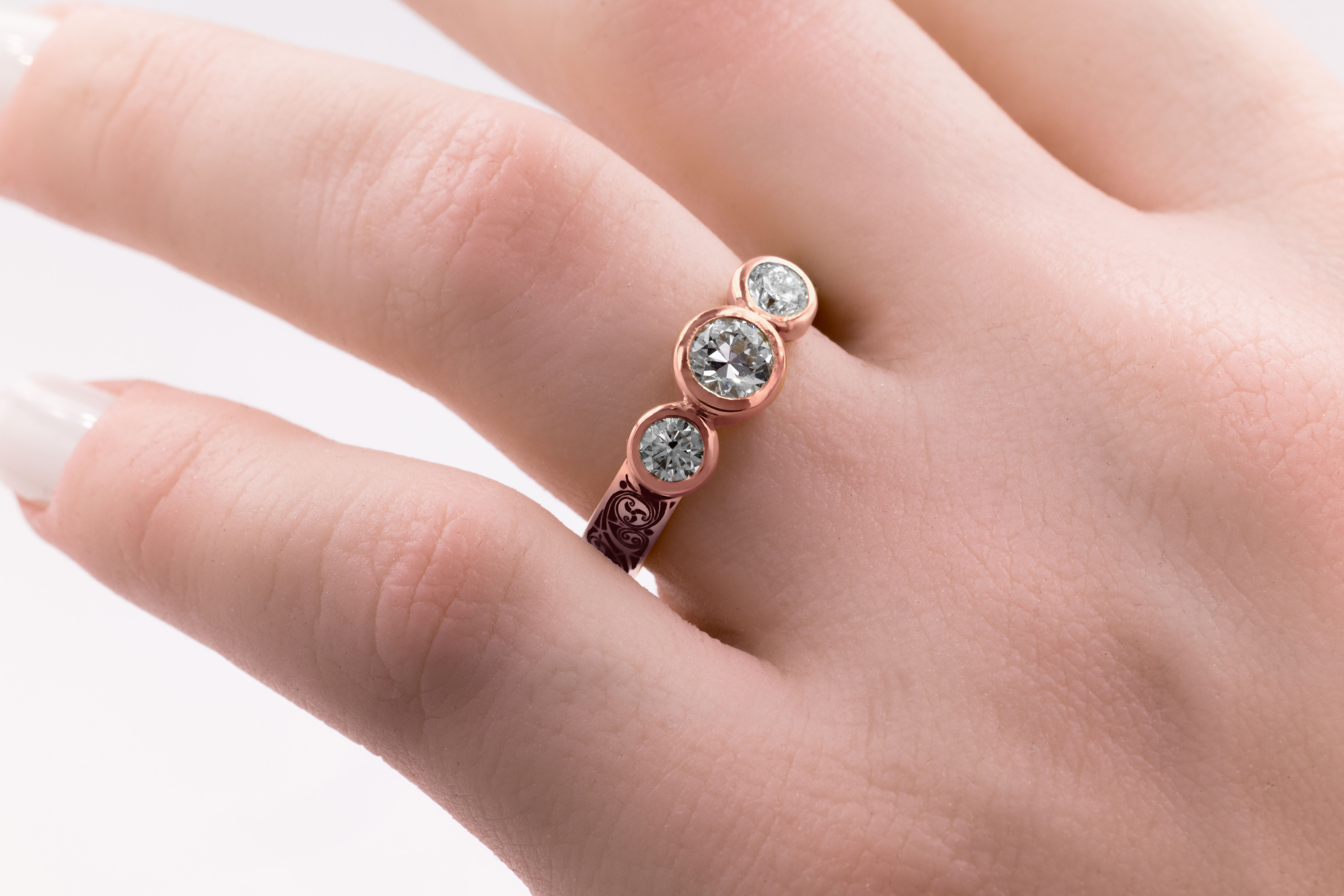 Authentic 18K Rose Gold Triskele 4.0mm Ring For Women With a Cerin Finish - Model Photo