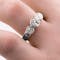 Womens Cerin Triskele Engagement Ring in Real Platinum 950 - Model Photo