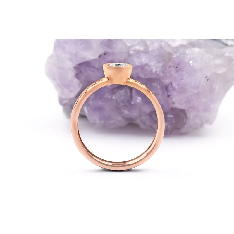 Authentic Rose Gold Celtic Knot 0.33ct Lab Grown Diamond Engagement Ring With a Cerin Finish For Women. Side View.