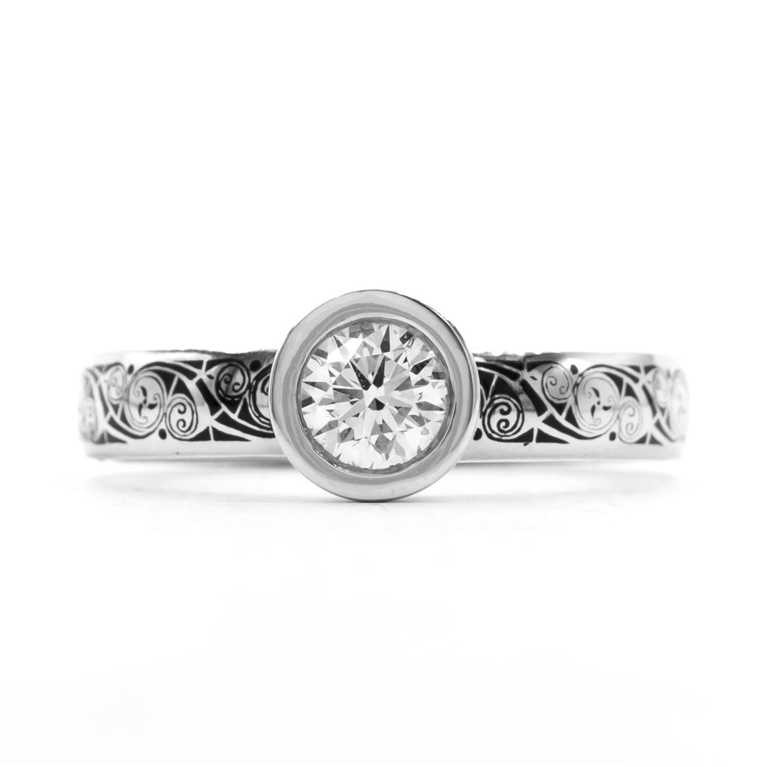Bezel Set Diamond Triskele Ring