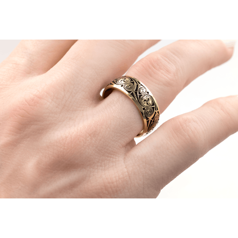 Authentic Yellow Gold Triskele 5.0mm Ring With a Cerin Finish - Model Photo