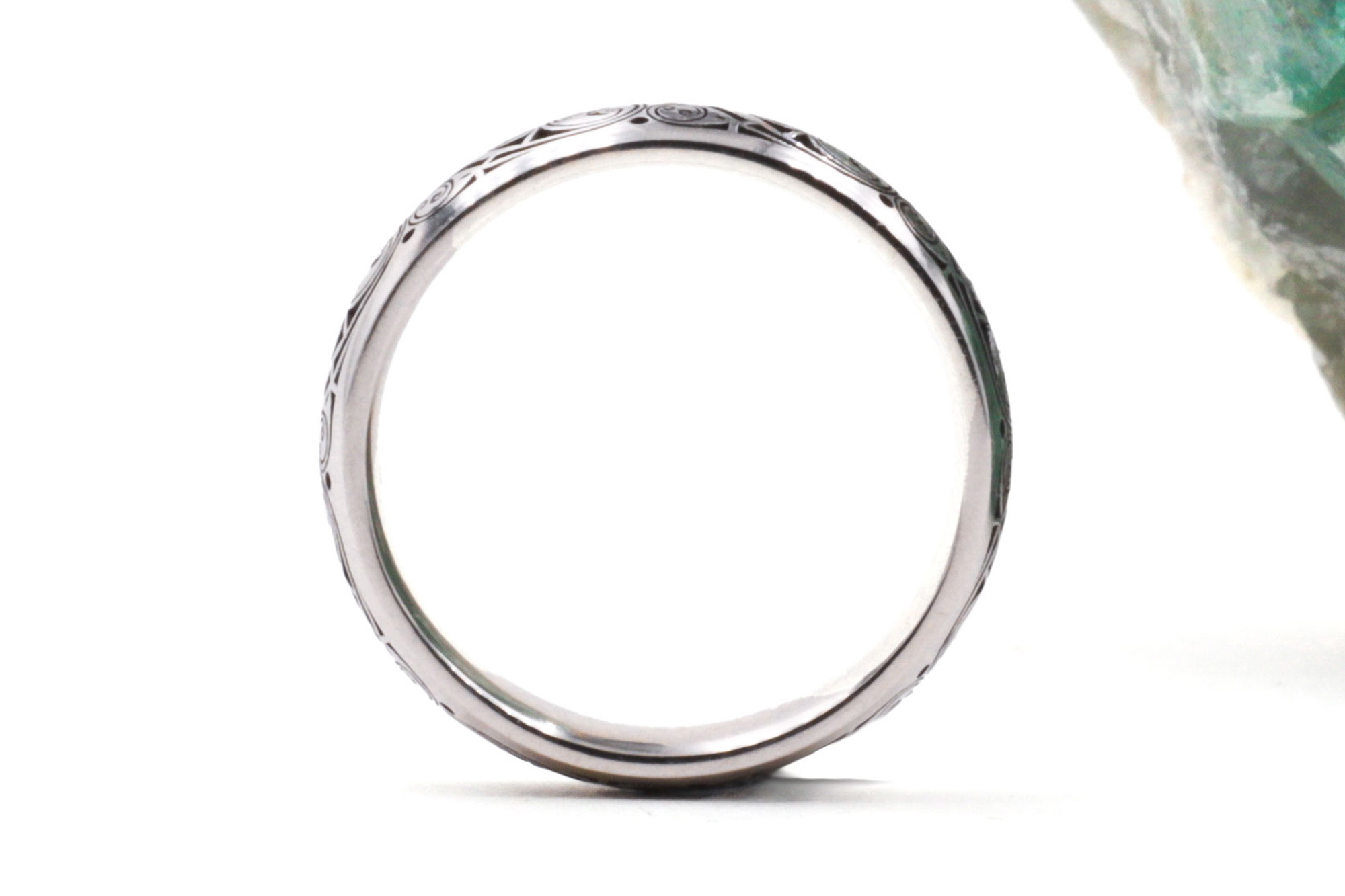 Striking Platinum 950 Triskele 5.0mm Ring With a Cerin Finish. Side View.