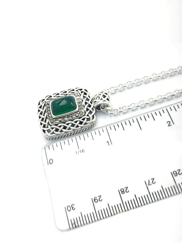 Womens Celtic Knot Necklace in Sterling Silver. Picture For Scale.