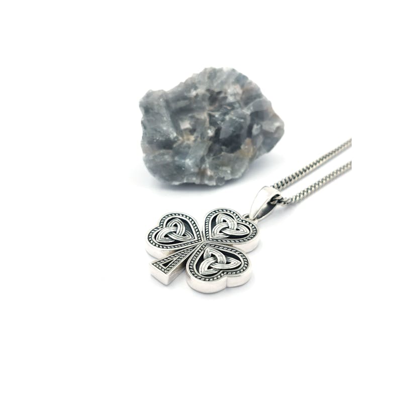 Genuine Sterling Silver Shamrock Necklace With a Oxidized Finish. Pictured Flat.