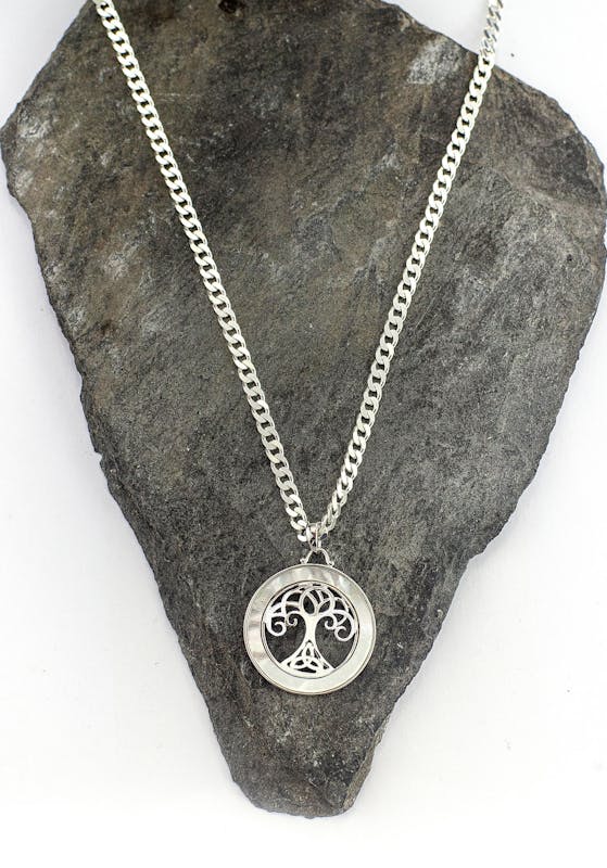 Small Womens Genuine Sterling Silver Tree of Life Necklace. Pictured Flat.