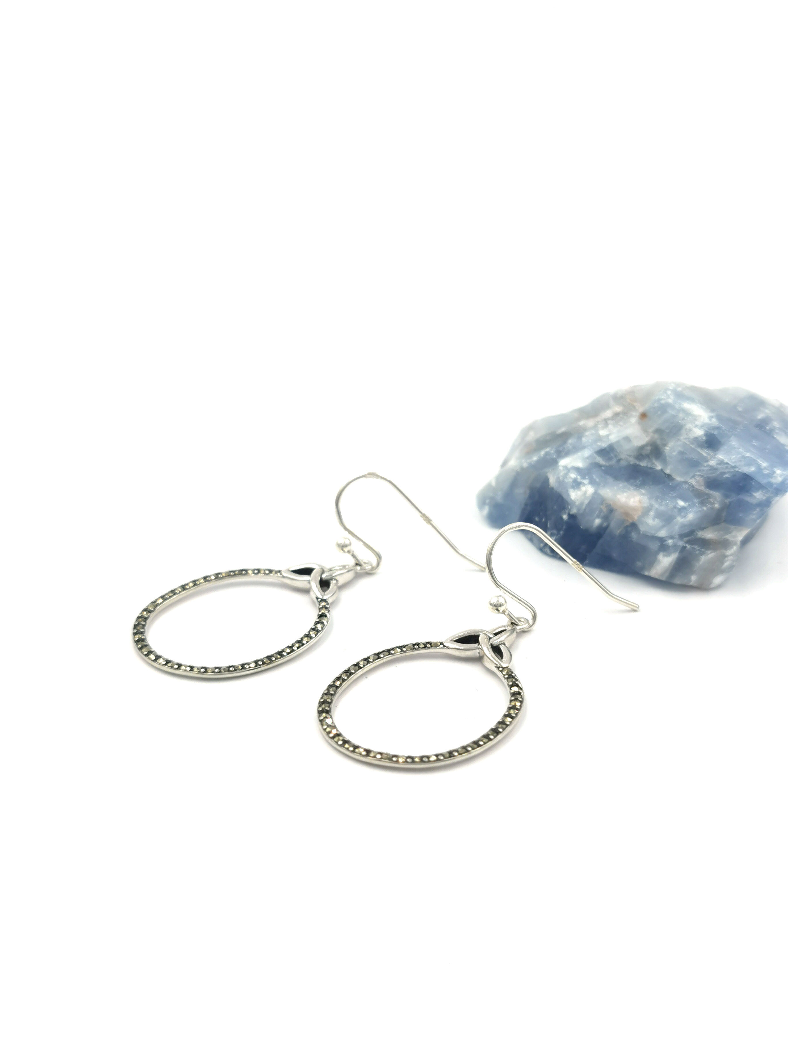 Womens Authentic Polished Sterling Silver Trinity Knot Earrings. Pictured Flat.