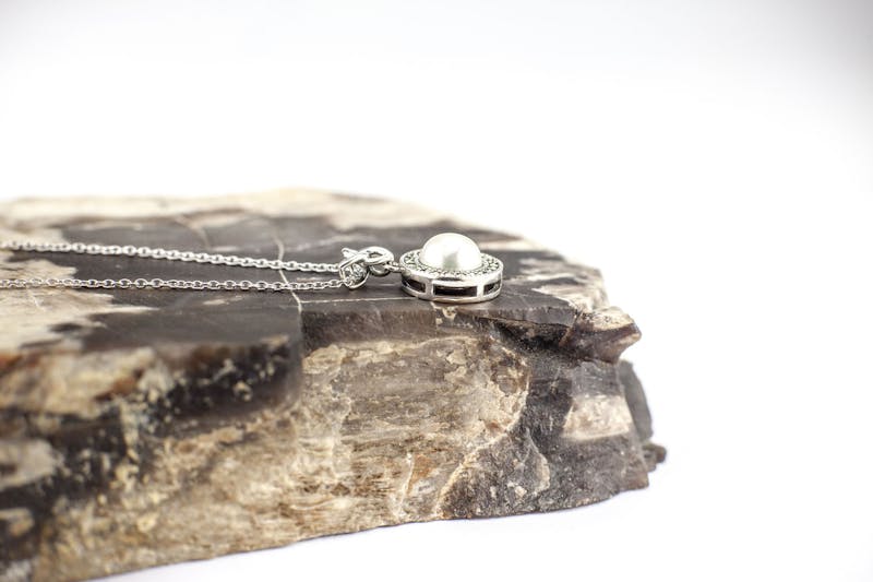 Womens Trinity Knot Necklace in Real Sterling Silver. Side View.