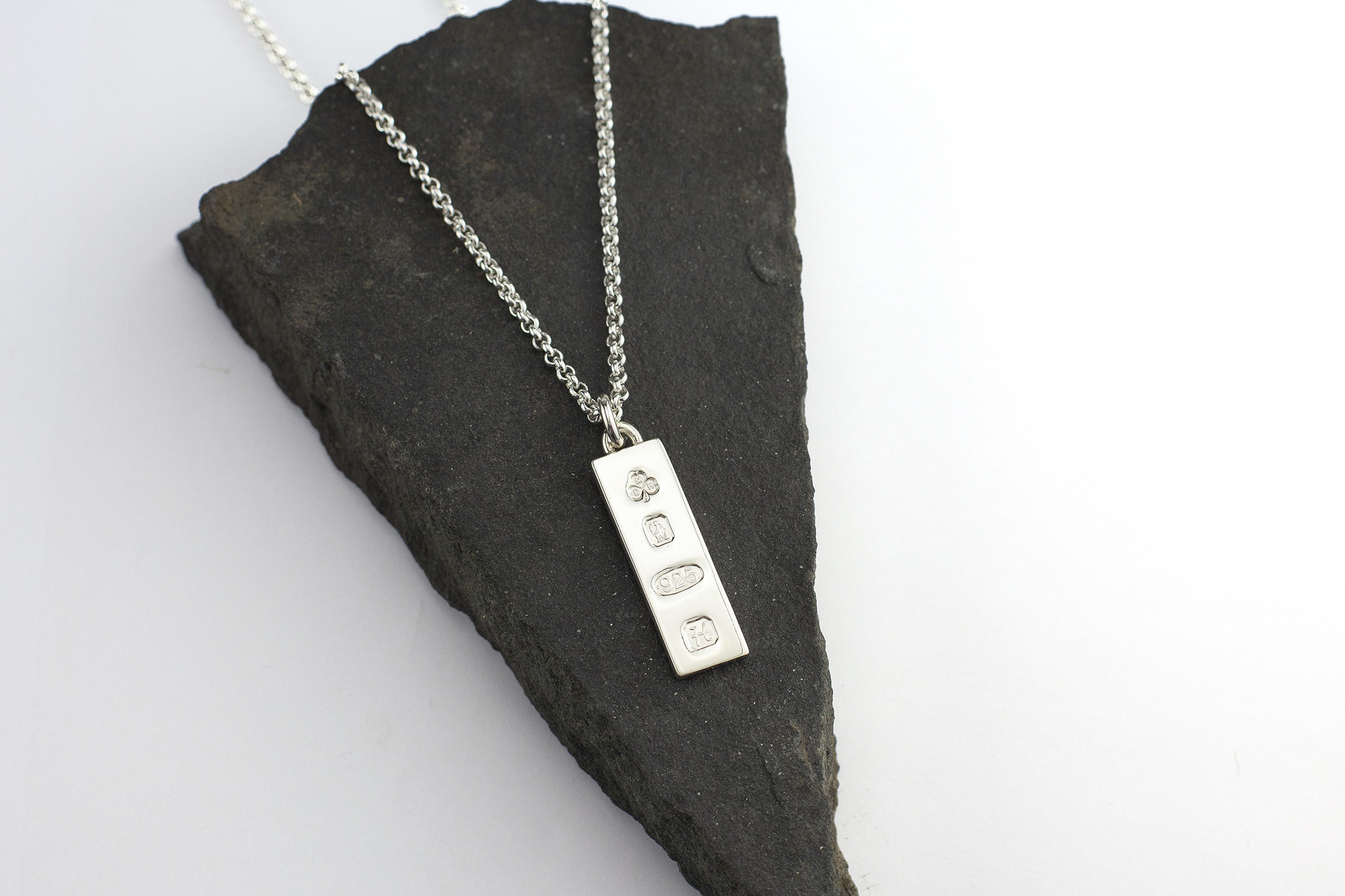 Sterling Silver Ogham & Triskele Necklace. Side View.