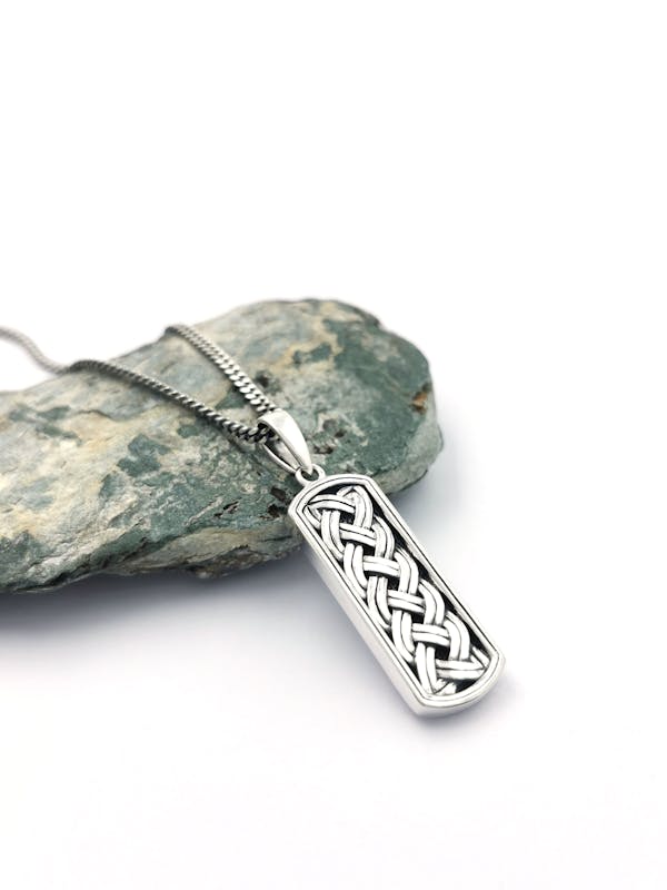 Mens Celtic Knot Necklace in Sterling Silver With a Oxidized Finish. Side View.