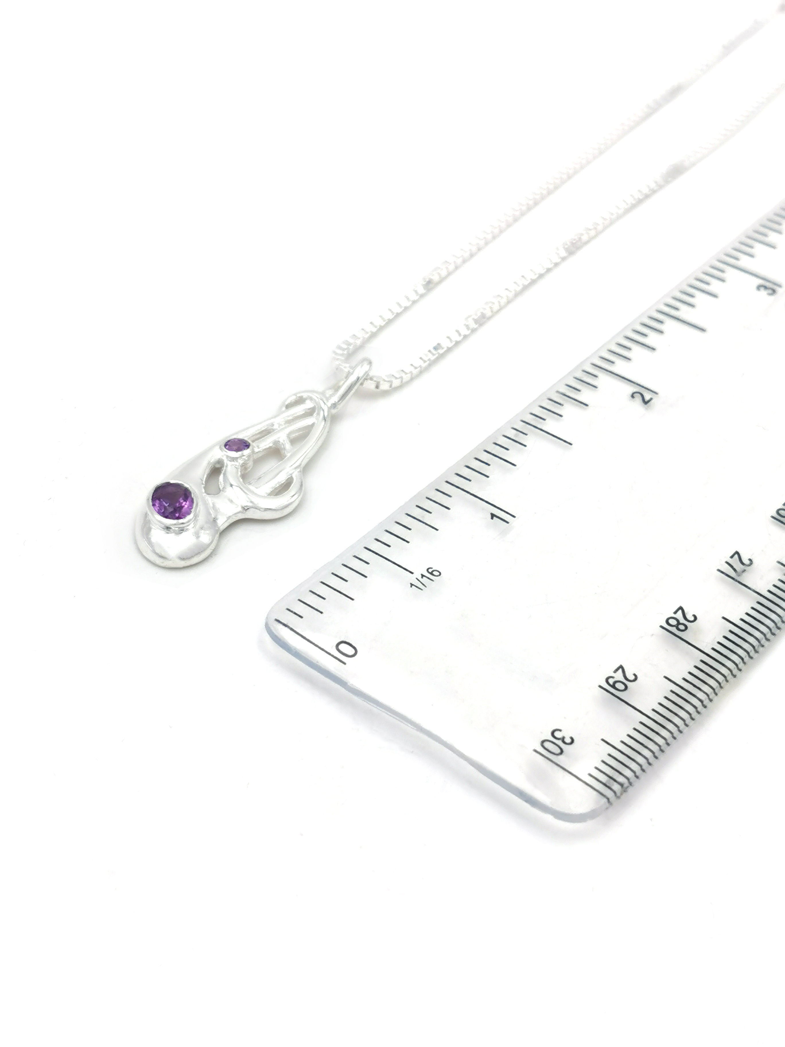 Womens Celtic Knot Necklace in Real Sterling Silver. Picture For Scale.