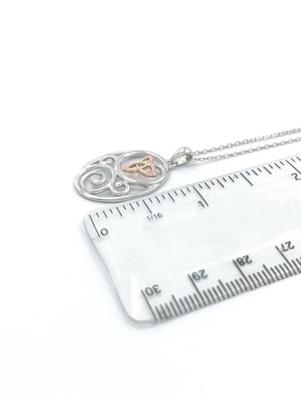 Womens Celtic Knot & Trinity Knot Necklace in Real Sterling Silver & Rose Gold. Picture For Scale.