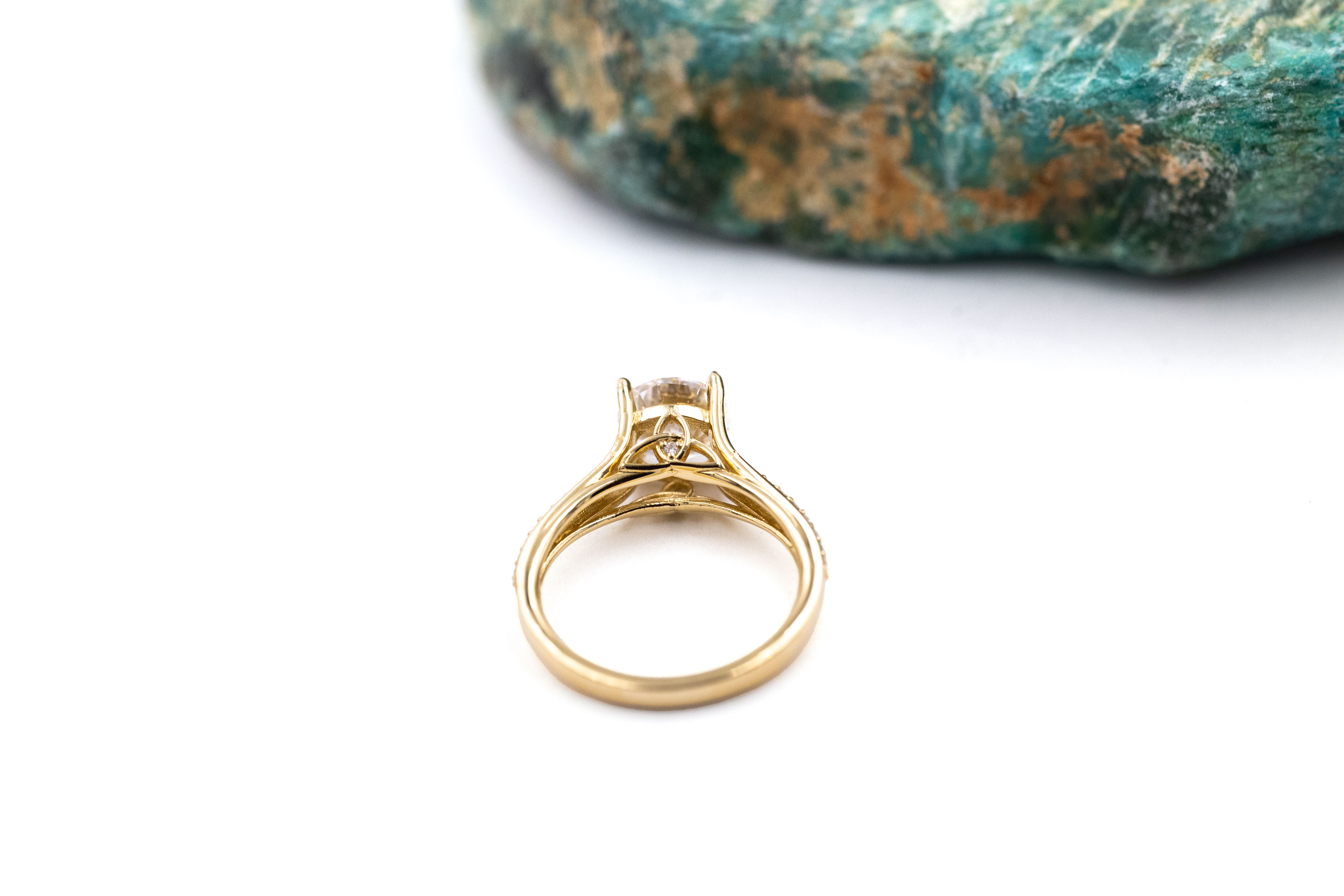 Genuine Yellow Gold Trinity Knot Ring For Women With a Polished Finish. Pictured Flat.