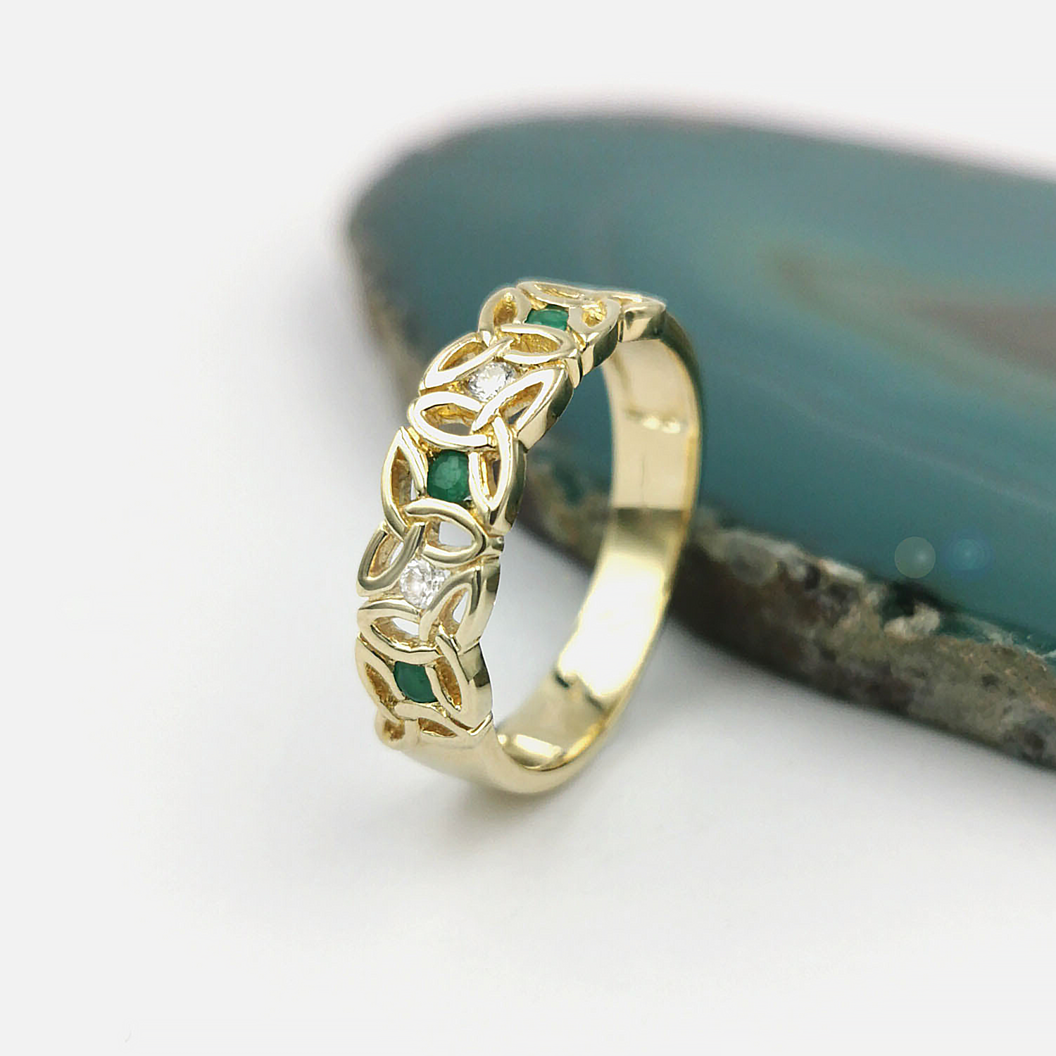 Gold Trinity Knot Ring with Emeralds and Diamonds