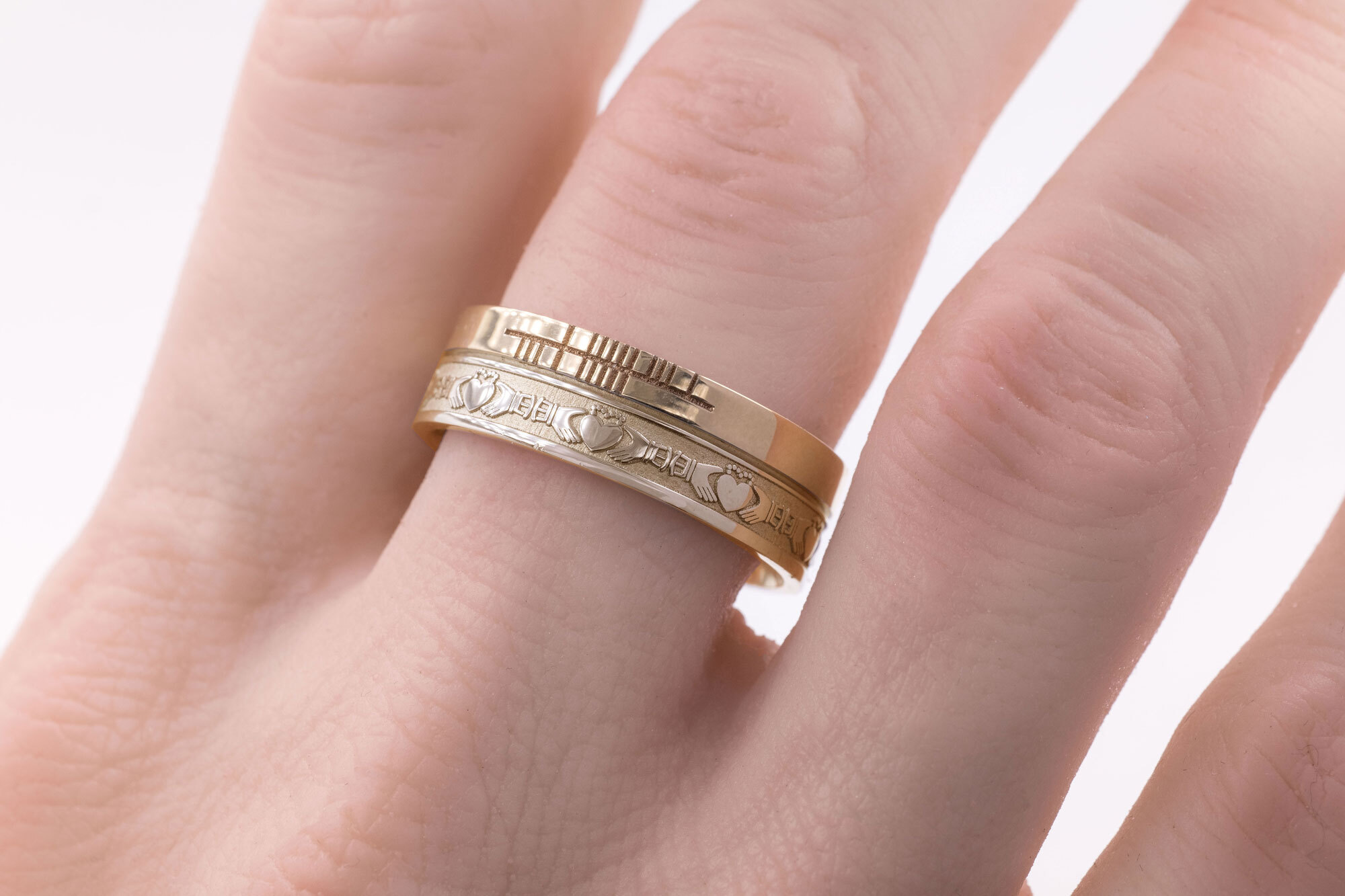 Attractive Yellow Gold Ogham & Claddagh 7.3mm Ring With a Florentine Finish - Model Photo