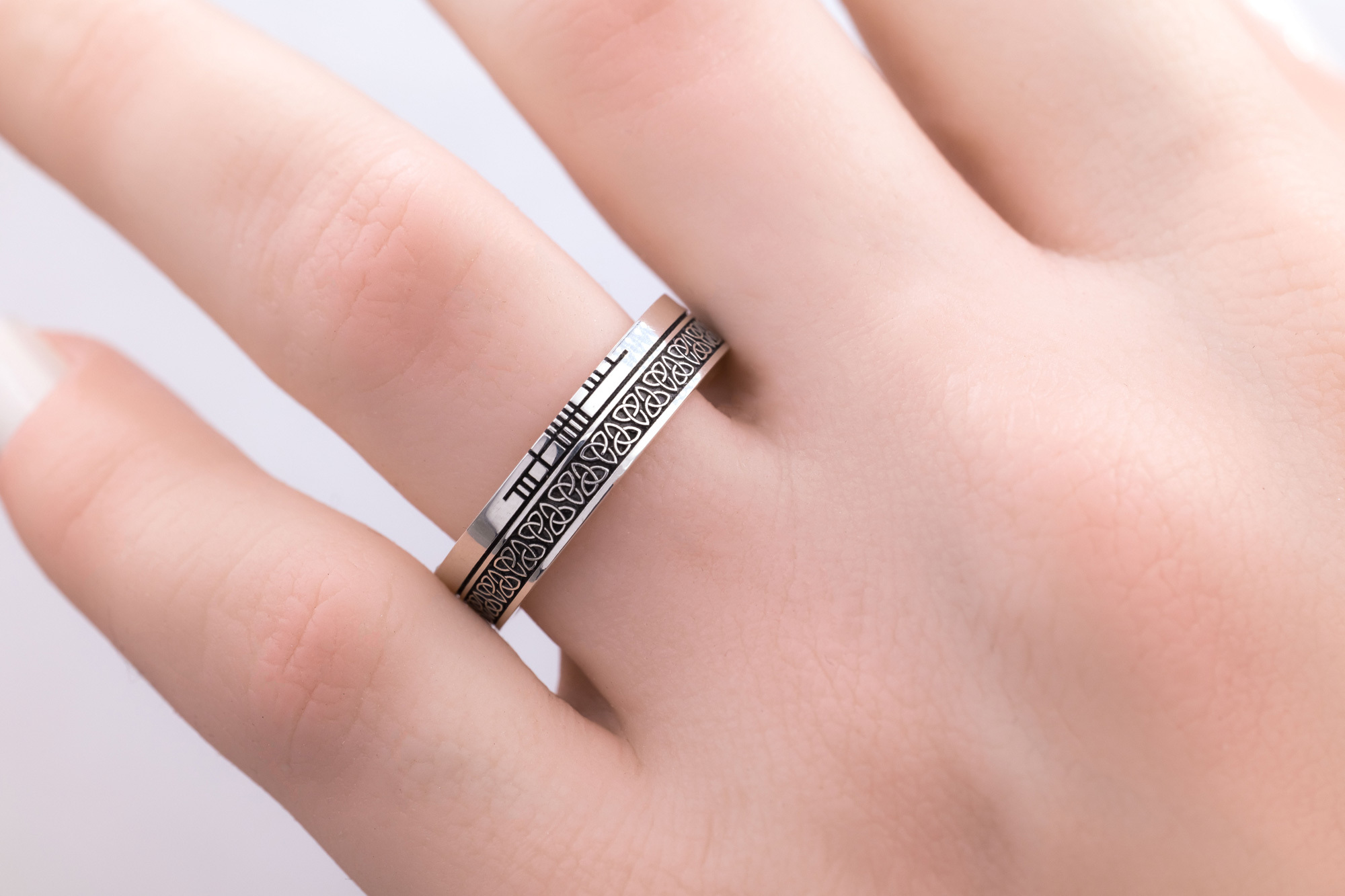 Ogham & Trinity Knot 5.2mm Ring in Sterling Silver With a Oxidized Finish - Model Photo