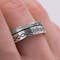 Ogham Wedding Ring in Sterling Silver With a Oxidized Finish - Model Photo
