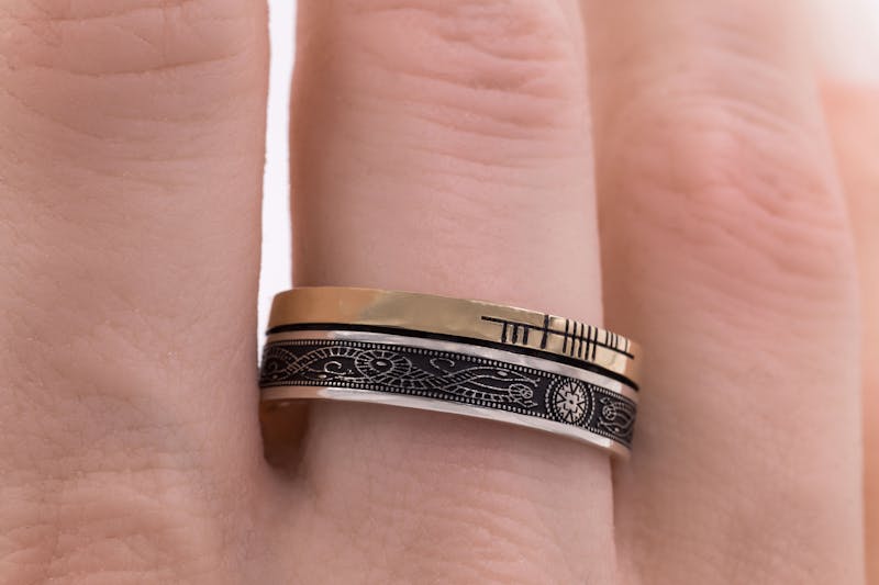 Real Sterling Silver & 10K Yellow Gold Ogham Engravable 5.2mm Ring With a Oxidized Finish - Model Photo
